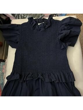 Sunday up youth size medium blue ruffled dress with flowy bottom.